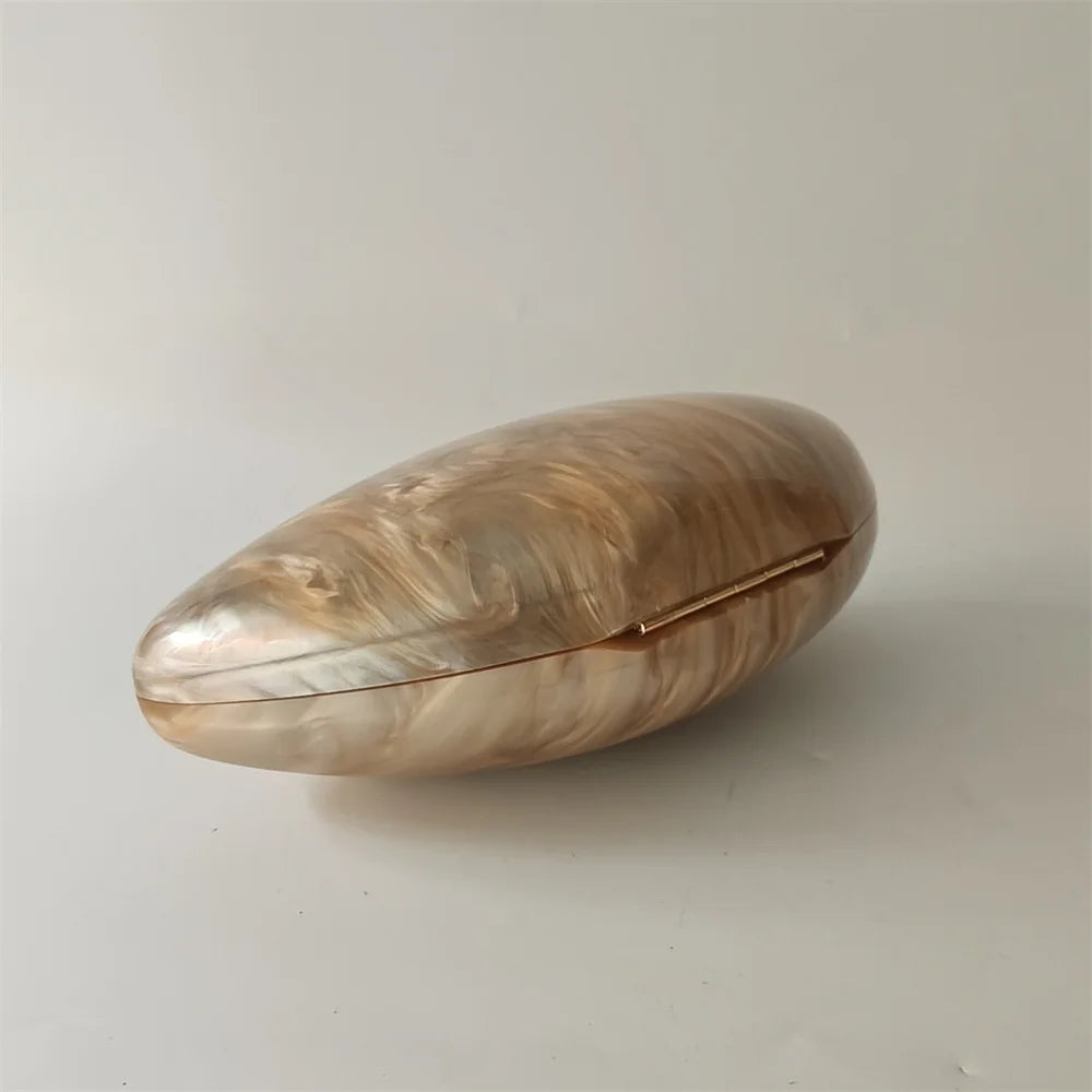Shell Luxe Clutch Collection