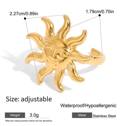 Gold sun-shaped earring with measurements and product details on a white background