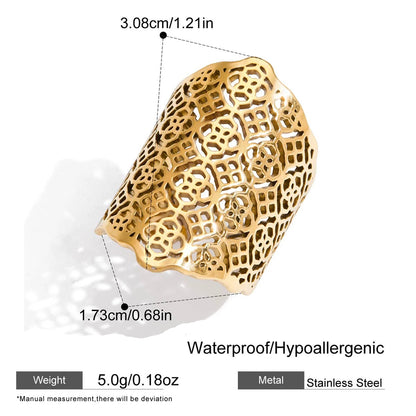Gold ring with intricate design and measurements on a white background